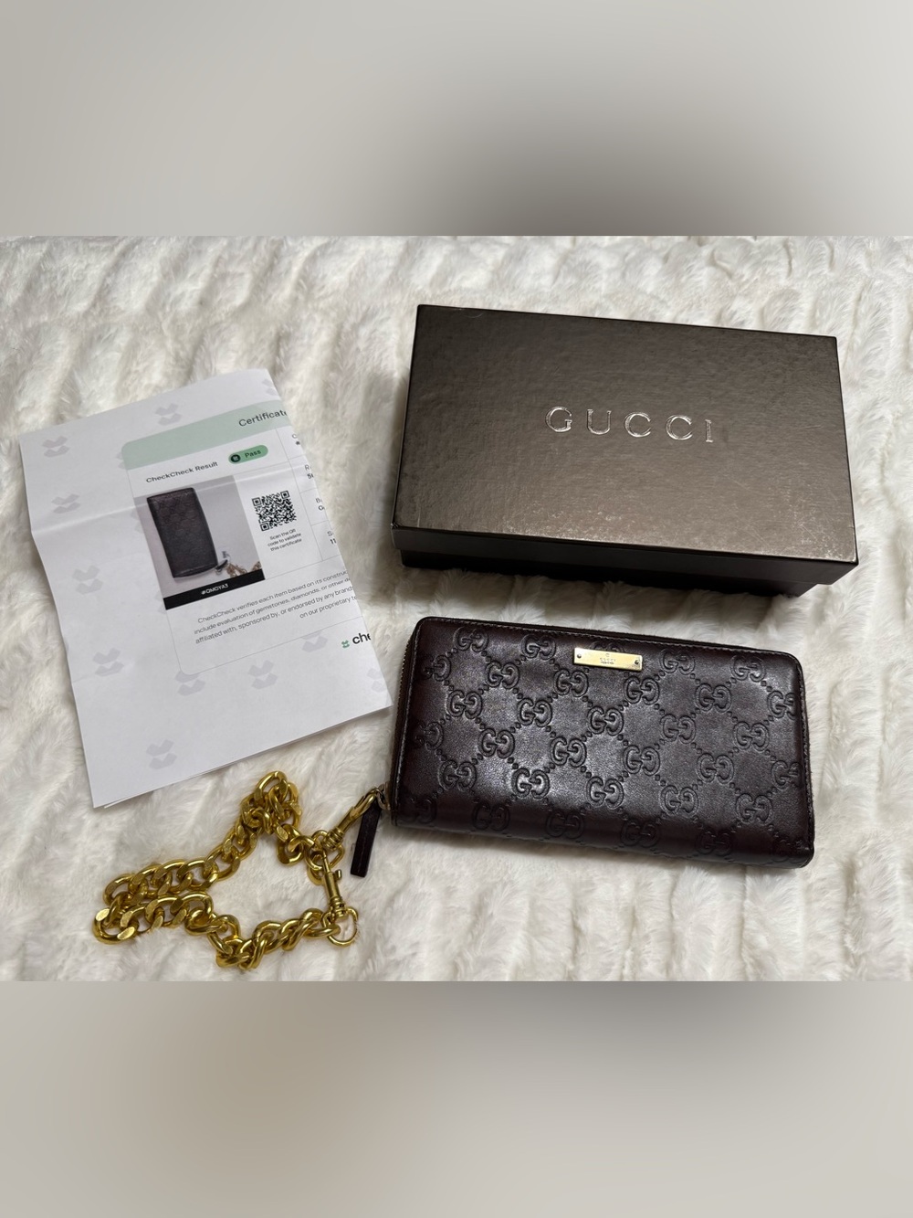 Gucci Dark Brown GG Embossed Leather Zip Card Holder with Gold Plate